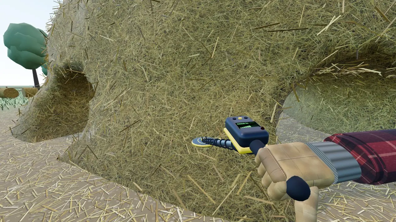 Sweeping the metal detector across the side of the haystack